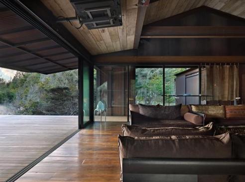 When stowed, the shutter panels nest beneath the roofs generous soffit.