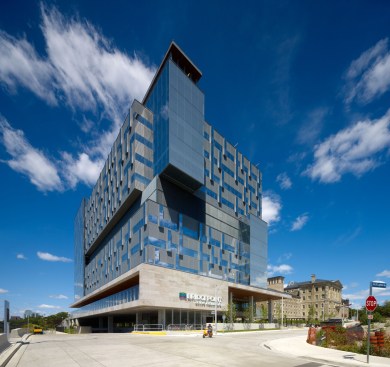 A detail of the south elevation of the new 10-story hospital. The base of the hospital is called the Urban Porch, which houses most of the community amenities and spaces.