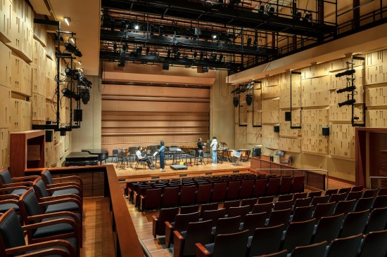 The new 225-seat multipurpose theater can swiftly convert from theater to concert mode by means of a flying shell, shown deployed here. 