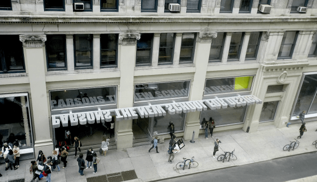 13th Street entry with cantilevered graphic identity canopy.