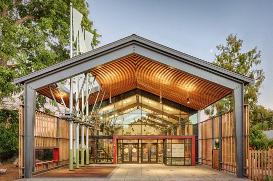 Large swings invite curiosity and play at the entrance to the Palo Alto Junior Museum and Zoo (JMZ).