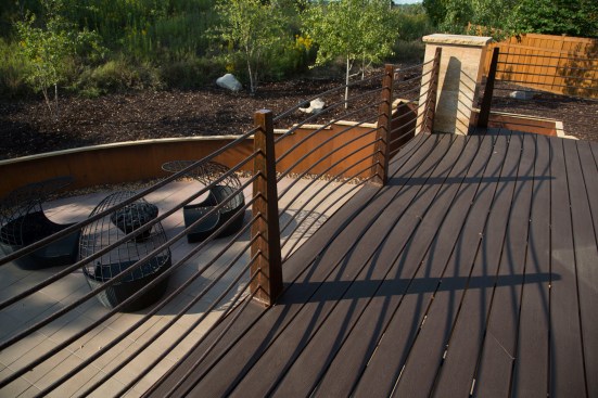 Minnetonka,  - Trace Ridge Rd in Minnetonka - Backyard, retaining wall, railing, table and art work. Photo by © Todd Buchanan 2012 Technical Questions: todd@toddbuchanan.com;