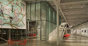 Track fixtures are used throughout the pavilion to provide flexibility for changing exhibits and functions and to accent the structure's architectural features (pictured and next image).