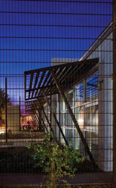 The screening and exterior accents are rusted steel, a local vernacular material.