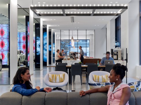 A seating area near the coffee bar provides a casual meeting and work place.
