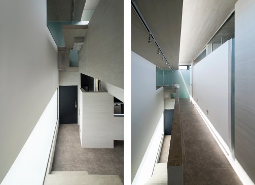 The second-floor hallway contains two sinks outside the bathroom on the west end.