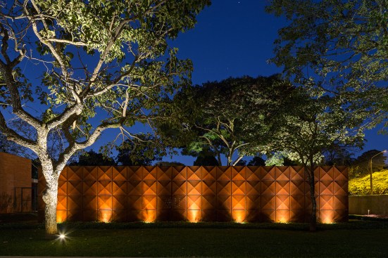 View of quilted Cor-Ten skin at night.