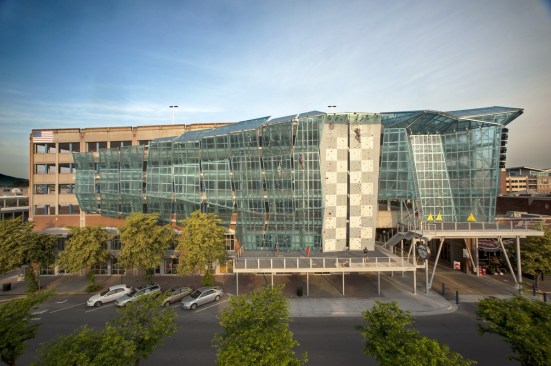 Duo public art piece/functional climbing wall looking towards the storied Tennessee Aquarium
