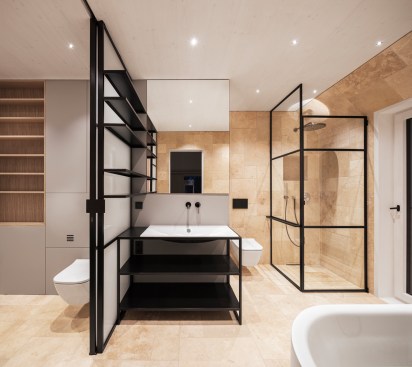 A sliding door in the middle of the shared bathroom allows flexible use by different people.