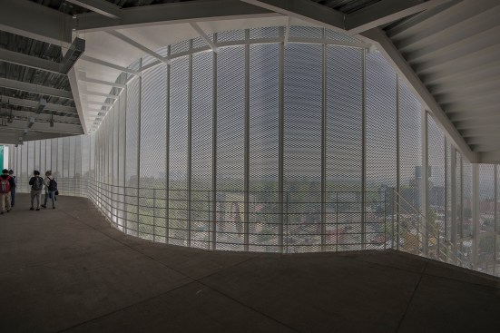 Walkway with view our through perforated metal skin