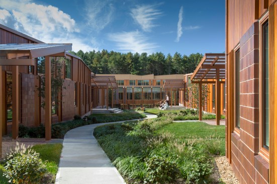 Working academic courtyard with learning pavilions