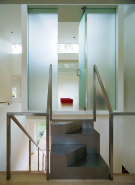 Custom Home, November/December 2009 Last Detail: Higher Ground Architect: David Jameson, Washington, D.C.; Builder: Added Dimensions, Washington, D.C. This suspended meditation chamber forms the physical and spiritual core of a Bethesda, Md., residence. The 8-foot-by-11-foot pod hangs from a series of exposed steel rods and receives added support from the shear wall beneath. Enclosed in translucent glass and plaster and bathed in daylight from nearby clerestory windows, the refuge casts a gentle glow into the center of the home.