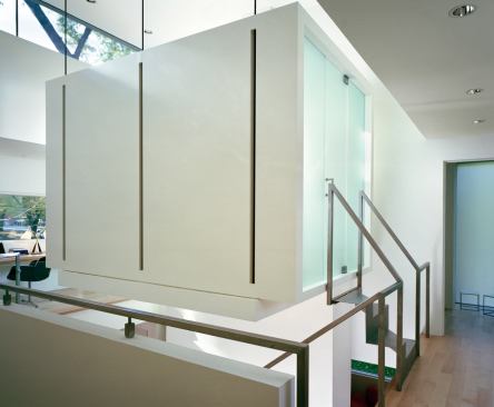 Custom Home, November/December 2009 Last Detail: Higher Ground  Architect: David Jameson, Washington, D.C.; Builder: Added Dimensions, Washington, D.C.  This suspended meditation chamber forms the physical and spiritual core of a Bethesda, Md., residence. The 8-foot-by-11-foot pod hangs from a series of exposed steel rods and receives added support from the shear wall beneath. Enclosed in translucent glass and plaster and bathed in daylight from nearby clerestory windows, the refuge casts a gentle glow into the center of the home.