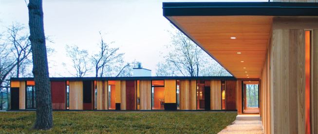 Camouflage House, Green Lake, Wis., - Front and Side Views  Custom Home of the Year  Entrant/Architect: Johnsen Schmaling Architects, Milwaukee  Builder: Gale Burg Construction, Malone, Wis.  Living space: 2,700 square feet  Site: 2.5 acres  Construction cost: $260 a square foot  Photographer: Kevin J. Miyazaki  In an effect inspired by the forest that surrounds it, views through this new lakeside home shift with one’s perspective. Its unfinished red cedar siding will gray to blend with the tree trunks.