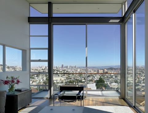 Postcard views of San Francisco serve as the living room's main decoration.