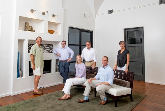 Founders of 30+ year-old firm, Walcott, Adams, Verneuille in Fairhope and Gulf Shores, Alabama, identified emerging leaders Ryan Baker and Abby Davis (seated) and made them principals in 2013 and 2019, respectively. Photo by Devin Ford. Courtesy of Walcott, Adams, Verneuille Architects.