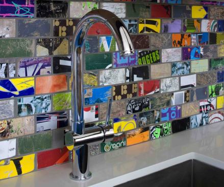 This kitchen backsplash was crafted by Erin Adams Design using recycled skateboards.