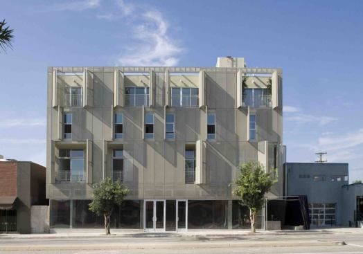 Located on Fairfax Avenue in West Hollywood, the Lofts achieved a WalkScore.com walkability score in the 94 to 98 range. Seven of the units are two-story townhomes; three units have 17-foot-high ceilings and open up into a courtyard.