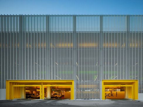 Car Park Four, Chesapeake Energy Corporation, Oklahoma City, 2015An architectural veil stretches over structural concrete and is punctuated by yellow entry portals.
