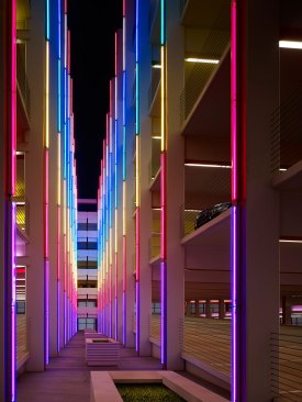 Car Park Three, Chesapeake Energy Corporation, Oklahoma City, 2013An air circulation atrium serves as a central walkway. Fluorescent T8 3500K lamps covered in theatrical colored gels, create an artistic experience.