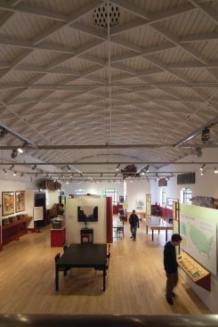 The interior of the Chinese Historical Society of America, originally designed by Morgan for the YMCA.