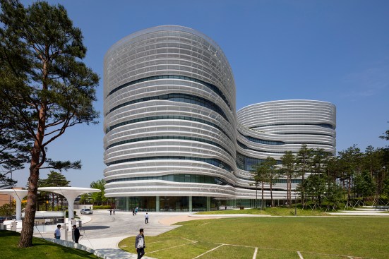 Computer modeling helped determine the ideal size of the perforations, which vary over the surface of the building, to minimize heat gain and maximize natural light to the different interior spaces throughout the year.