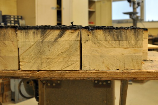 Protective char layer on three-ply cross-laminated timber floor panel that was initially protected with two layers of 13-millimeter Type X gypsum board. The text was terminated after 77 minutes.