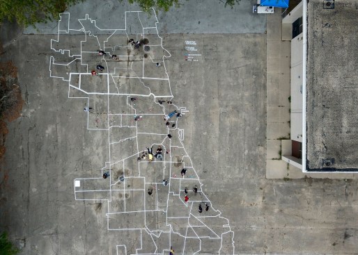 As part of the Creative Grounds initiative led by Borderless Studio, a human-scale map at the former Anthony Overton Elementary School grounds, in Chicago, invites visitor interaction.