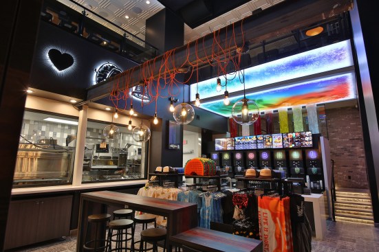 The two-story central space in Taco Bell’s flagship Cantina on the Las Vegas strip has the atmosphere of a dance club. The molded relief in the ceiling panels above the second floor can be clearly seen from below.