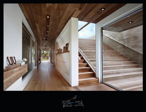 Glass walls blur the line between indoors and out.