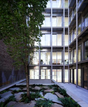 The interior courtyard allows natural light into the apartments from a second exposure.