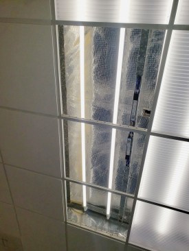 Old fluorescent tubes were replaced with energy-conserving LED tubes. New high-efficiency ballasts had to be installed, but that allowed the library to keep the existing fixtures and light boxes and minimize the upgrade cost.  