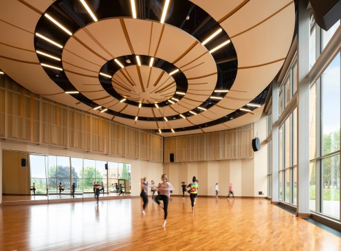 Dance class with panels that rotate from mirrored to acoustic