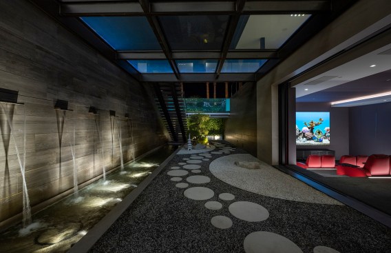 Serenity Indian Wells modern mansion luxury home theater with custom red leather seats