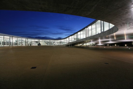 Rolex Learning Center, EPFL, Lausanne, Switzerland. Exterior view by night