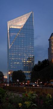 The simplicity of the nighttime effect belies the substantial technical hurdles encountered. By carefully coordinating different sources and wattages appropriate for each architectural space, the lighting design accommodates the change in scale and material from one glass surface to another. The successful rendering of the building top, along with themes first experienced at the base, creates a seamless final composition.