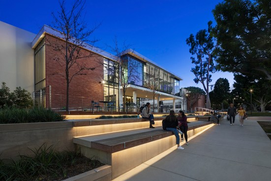 Built-in seating attracts students, engages Friendship Walk and activates the courtyard.