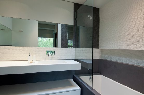Sleek, modern bathroom design at Beverly Hills home.
