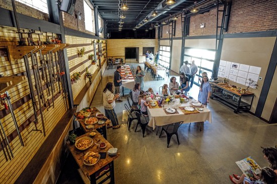 Guild Row in Chicago is an adaptive-reuse project transforming former manufacturing sites into a flexible campus for a local social club. DAAM’s architectural interventions include a member lounge, teaching kitchen, courtyard, and more.