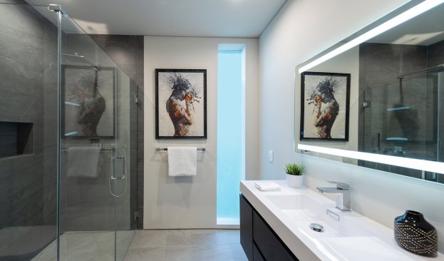 Luxury modern master bathroom soaking tub with Hollywood Hills view.