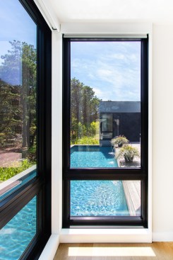 The TV room / den projects into the pool, for a sense that you're floating. 
