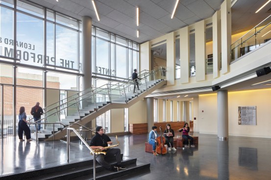 The lobby's dramatic grand stair offers the opportunity to see and be seen and  impromptu get-togethers.