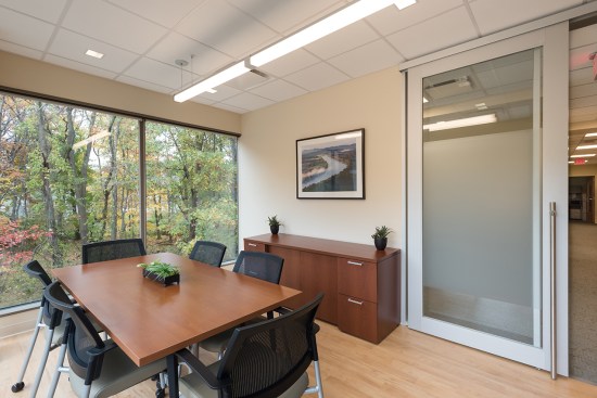 Staff collaboration rooms located within each corner of every pod.