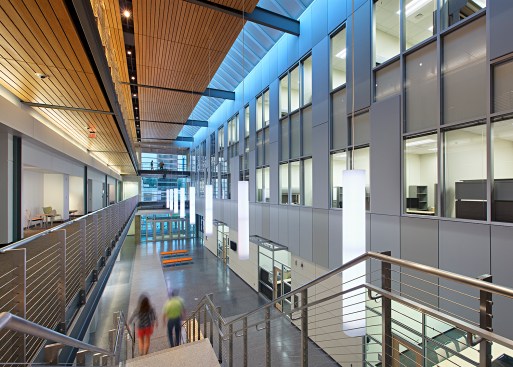 A sky-lit atrium runs the length of the building