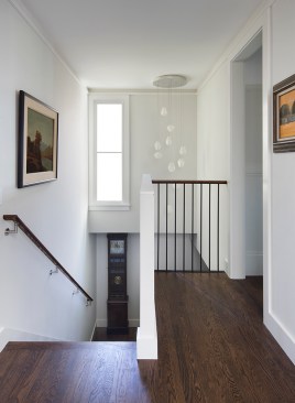 The vocabulary of cherry and infusion of light is evident in the upstairs bathroom.