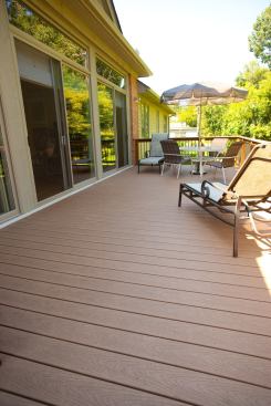 The spacious backyard deck is made of Trex wood-composite decking.