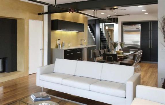 An open ground level welcomes commercial ventures  ample glazing in the steel-clad volume brings light to the private realm.