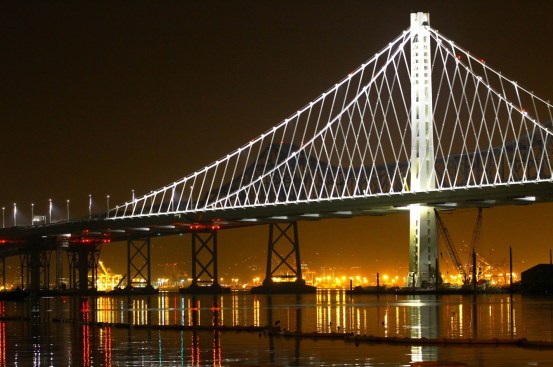 Donald MacDonald, east span of the San Francisco-Oakland Bay Bridge, under construction, 2013. Image courtesy James Daisa, CC BY 2.0 DEED.