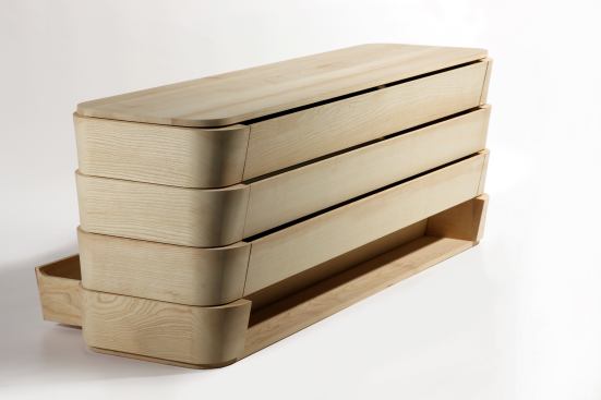 At the "Nouvelle Vague" exhibition, Parisian studio A+A Cooren's Yabané dresser featured rounded corners and long, shinglelike, two-direction drawers. 
aplusacooren.com