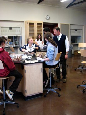 The building features four discipline-specific science lab rooms.